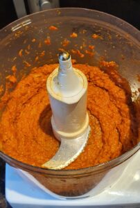 blending the red peppers into a smooth paste.