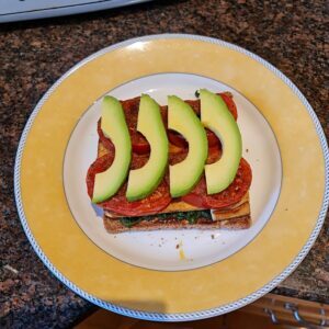 thinly sliced avocado laid on top