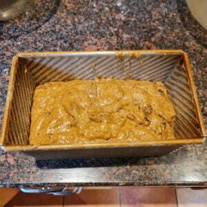 Ready to bake, mixture poured into the loaf tin
