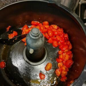 halved plum tomatoes in actifry