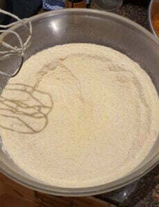 whisk the flours and create a well