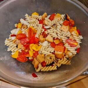 cooked pasta added to the bowl
