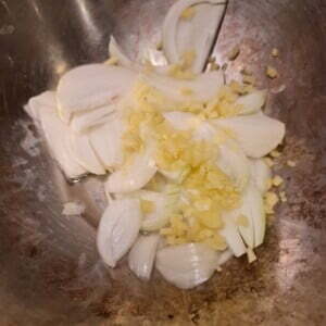 Add onion ginger & garlic to a wok with