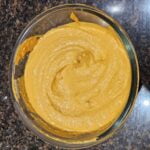 Red pepper hummus in the bowl