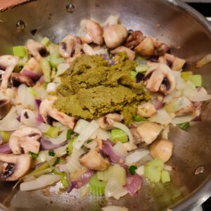 add in the green curry paste