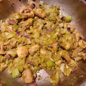 Green Curry paste stired in