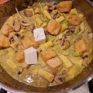cooking the curry to get the veggies tender enough