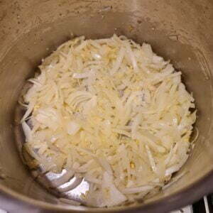 cooking the onions in the pan