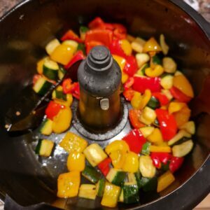 cooking the peppers, courgette & chillies