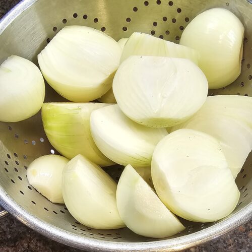 peeled & halved yellow onions